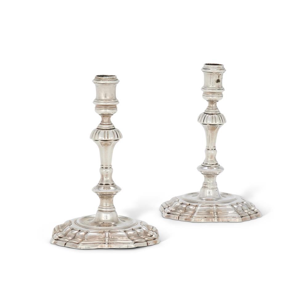 A PAIR OF GEORGE II SILVER TAPERSTICKS BY JAMES GOULD