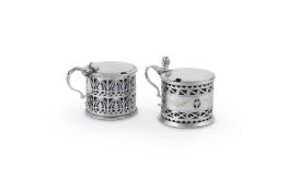 TWO GEORGE III SILVER PIERCED DRUM MUSTARD POTS BY ROBERT HENNELL I