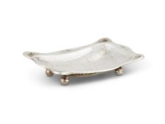 AN ARTS AND CRAFTS HAMMERED SILVER PIN DISH OR SALT CELLAR BY OMAR RAMSDEN