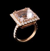 A DIAMOND AND MORGANITE CLUSTER RING