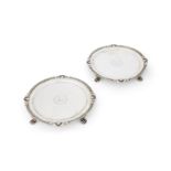 A PAIR OF GEORGE III IRISH SILVER CIRCULAR SALVERS BY CHARLES MARSH