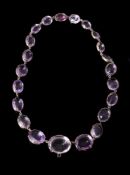 AN EARLY VICTORIAN AMETHYST RIVIÉRE NECKLACE