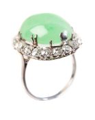 A MID 20TH CENTURY JADEITE AND DIAMOND CLUSTER RING