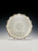 A WILLIAM IV SILVER LARGE SHAPED CIRCULAR SALVER BY PAUL STORR