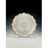 A WILLIAM IV SILVER LARGE SHAPED CIRCULAR SALVER BY PAUL STORR