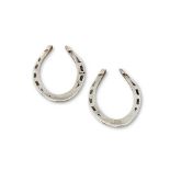 A CASED PAIR OF SILVER HORSE SHOES BY HUKIN & HEATH