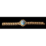 A MID VICTORIAN DIAMOND AND HALF PEARL BLUE ENAMELLED BRACELET