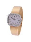 OMEGA, A LADY'S TWO COLOUR 18 CARAT GOLD AND DIAMOND BRACELET WATCH