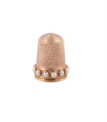 A GOLD AND SPLIT SEED PEARL THIMBLE