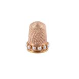 A GOLD AND SPLIT SEED PEARL THIMBLE