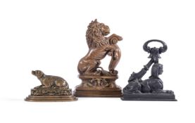 THREE DOOR PORTERS INCLUDING A BRONZE OR BELL METAL SEATED DOG, LATE 19TH CENTURY