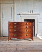 A GEORGE III 'FIDDLEBACK' MAHOGANY SERPENTINE COMMODE, IN THE MANNER OF INCE & MAYHEW, CIRCA 1790