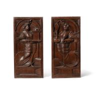 A PAIR OF FLEMISH SCULPTED OAK ALLEGORICAL PANELS, 17TH CENTURY