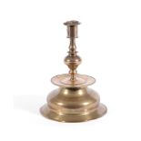 A BRASS CANDLESTICK, PROBABLY FLEMISH OR SCANDINAVIAN, MID 17TH CENTURY