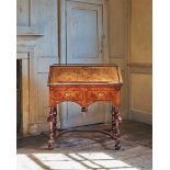 A DOUBLE-SIDED FIGURED WALNUT AND FEATHER BANDED BUREAU ON STAND, CIRCA 1690 AND LATER