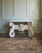 A DUTCH CARVED PINE AND WHITE PAINTED “KWAB” CONSOLE TABLE, CIRCA 1670 AND LATER