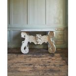 A DUTCH CARVED PINE AND WHITE PAINTED “KWAB” CONSOLE TABLE, CIRCA 1670 AND LATER