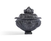 A GRAND TOUR CARVED SERPENTINE MARBLE LIDDED VASE OR INKWELL, IN THE 16TH CENTURY VENETIAN MANNER