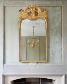 A GEORGE I GILTWOOD AND GESSO WALL MIRROR IN THE MANNER OF MOORE & GUMLEY, CIRCA 1720