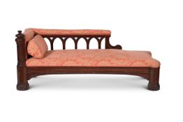 A GOTHIC REVIVAL MAHOGANY AND UPHOLSTERED DAYBED, IN THE MANNER OF A. W. N. PUGIN