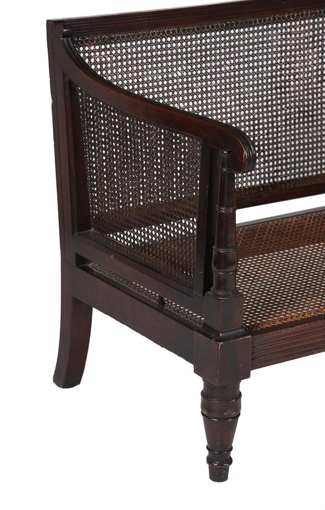 A REGENCY MAHOGANY AND CANED BERGÈRE SETTEE, IN THE MANNER OF WILLIAM TROTTER, CIRCA 1815 - Image 5 of 5