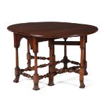 A RARE GEORGE I PADOUK GATELEG DINING TABLE, CIRCA 1720