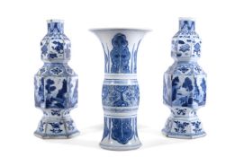 A PAIR OF CHINESE KANGXI BLUE AND WHITE VASES OF HEXAGONAL STEPPED FORM, CIRCA 1700
