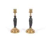 A PAIR OF FRENCH BRONZE AND ORMOLU CANDLESTICKS, PROBABLY THIRD QUARTER 19TH CENTURY