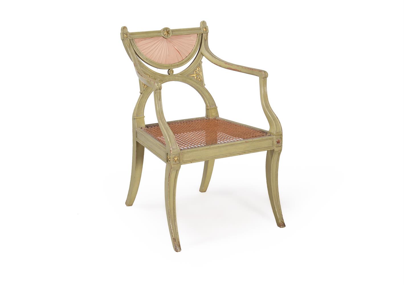 A PAINTED AND PARCEL GILT OPEN ARMCHAIR, AFTER A DESIGN BY GEORGE SMITH, CIRCA 1815