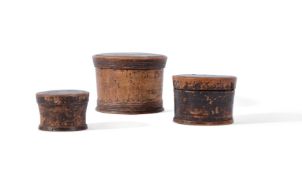 A SET OF THREE TREEN CIRCULAR LIDDED CONTAINERS, 18TH/19TH CENTURY