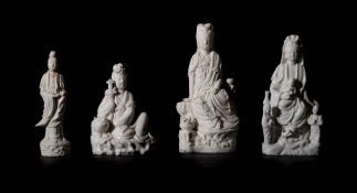 A GROUP OF FOUR CHINESE BLANC DE CHINE FIGURES OF GUANYIN, KANGXI AND LATER