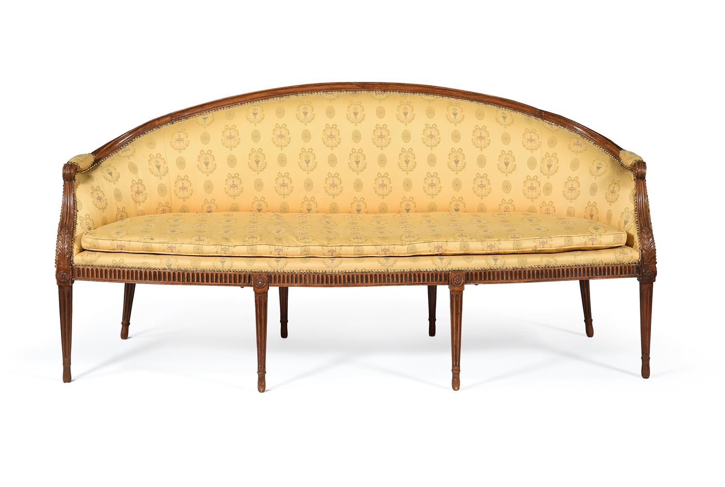 A GEORGE III BEECH AND UPHOLSTERED SOFA, IN THE MANNER OF ROBERT ADAM, CIRCA 1785