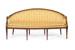A GEORGE III BEECH AND UPHOLSTERED SOFA, IN THE MANNER OF ROBERT ADAM, CIRCA 1785