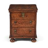 A GEORGE I ELM BOX COMMODE, CIRCA 1720