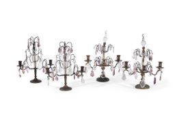 TWO PAIRS OF SIMILAR CUT-GLASS, PATINATED AND GILT METAL CANDELABRA IN THE MANNER OF MAISON JANSEN