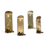 A SET OF FOUR EMBOSSED SHEET BRASS WALL SCONCES, 18TH CENTURY