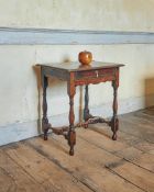 A QUEEN ANNE OAK SIDE TABLE, CIRCA 1710