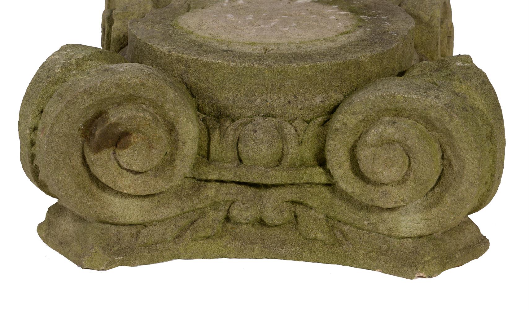 A PAIR OF SCULPTED LIMESTONE IONIC ORDER CAPITALS, LATE 18TH OR EARLY 19TH CENTURY - Image 2 of 3