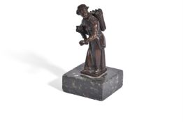 MANNER OF BARTHELEMY PRIEUR, A BRONZE MODEL OF A FEMALE PEDLAR, LATE 17th OR EARLY 18TH CENTURY