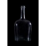 A GLASS WINE BOTTLE, CIRCA 1730