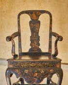 A GEORGE II BLACK LACQUER AND GILT JAPANNED ARMCHAIR, CIRCA 1730