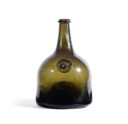 A SEALED AND DATED GLASS WINE BOTTLE, DATED 1737