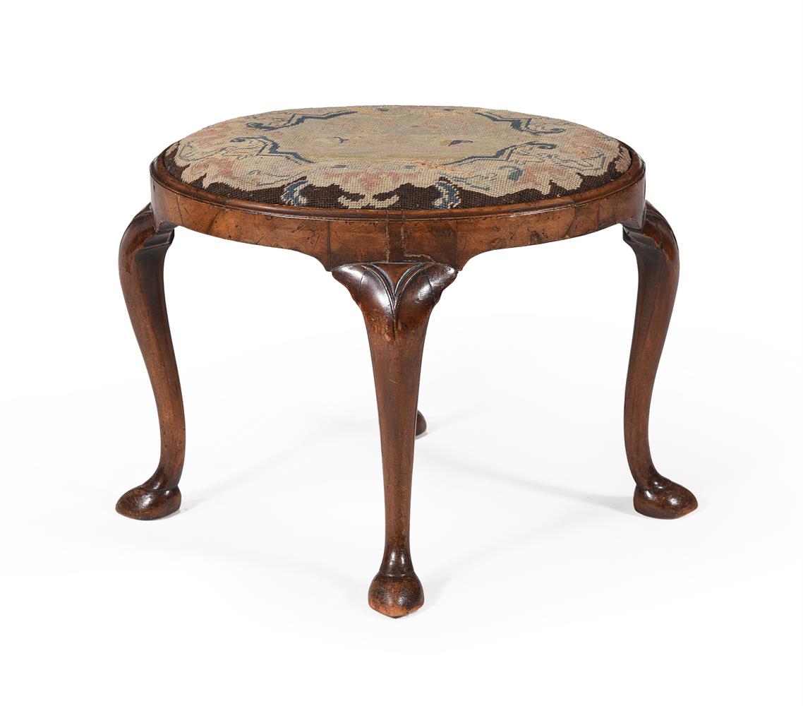 A WALNUT OVAL STOOL, IN QUEEN ANNE STYLE