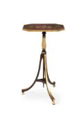 A REGENCY EBONISED, PARCEL GILT, SIMULATED MARBLE AND PAINTED METAMORPHIC TRIPOD TABLE, CIRCA 1815