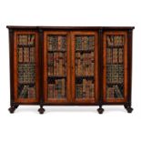 A REGENCY MAHOGANY BREAKFRONT BOOKCASE, CIRCA 1815