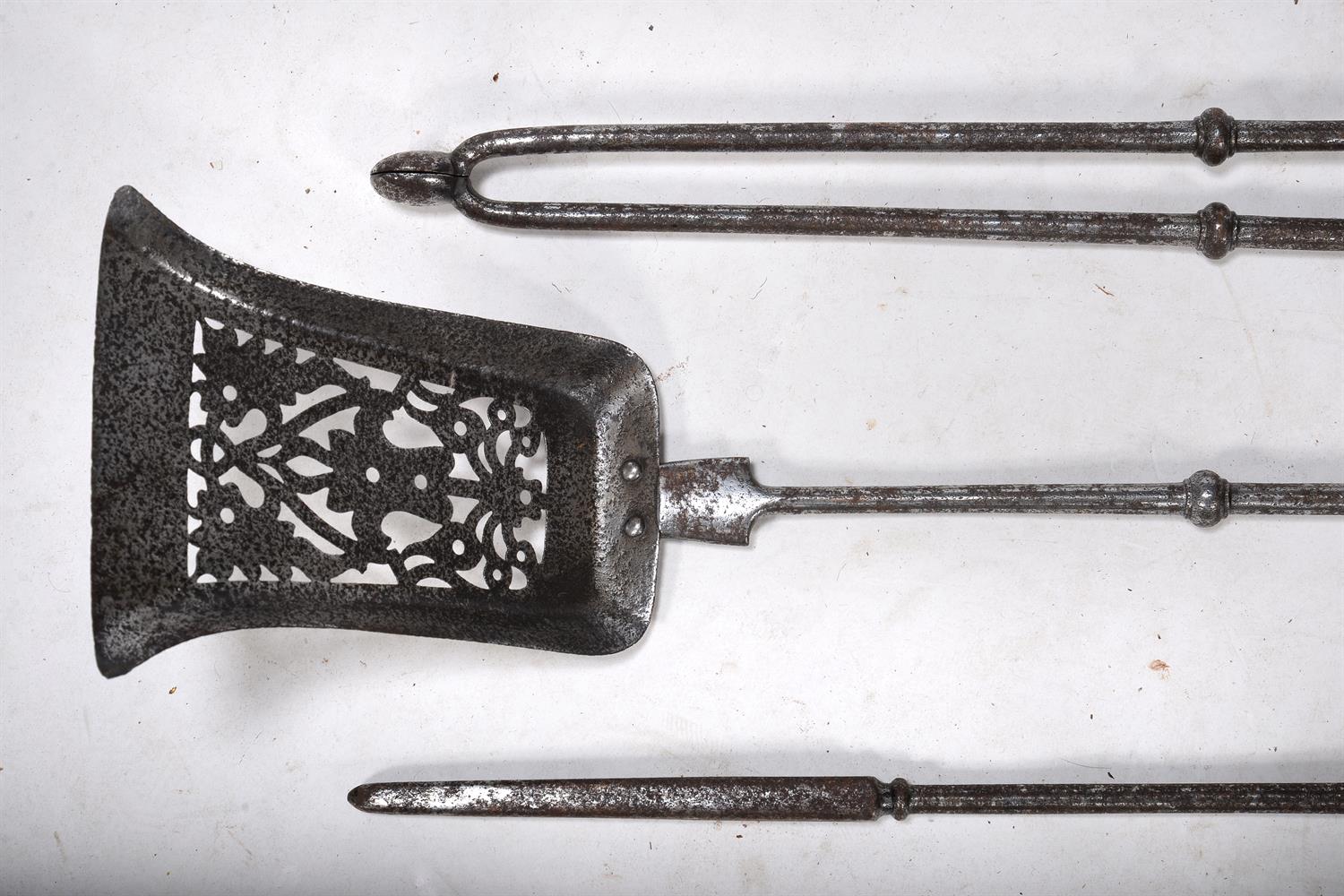 A SET OF THREE LION HANDLED POLISHED STEEL FIRE TOOLS, EARLY 19TH CENTURY - Image 3 of 3