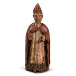 A CARVED POLYCHROME DECORATED FIGURE OF A BISHOP, PROBABLY SPANISH OR PORTUGUESE, MID 16TH CENTURY