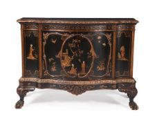 A BLACK LACQUER AND GILT CHINOISERIE DECORATED SERPENTINE COMMODE, IN GEORGE II STYLE