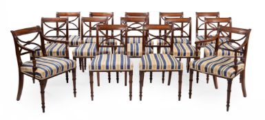 A SET OF FOURTEEN GEORGE IV MAHOGANY DINING CHAIRS, IN THE MANNER OF GILLOWS, CIRCA 1820