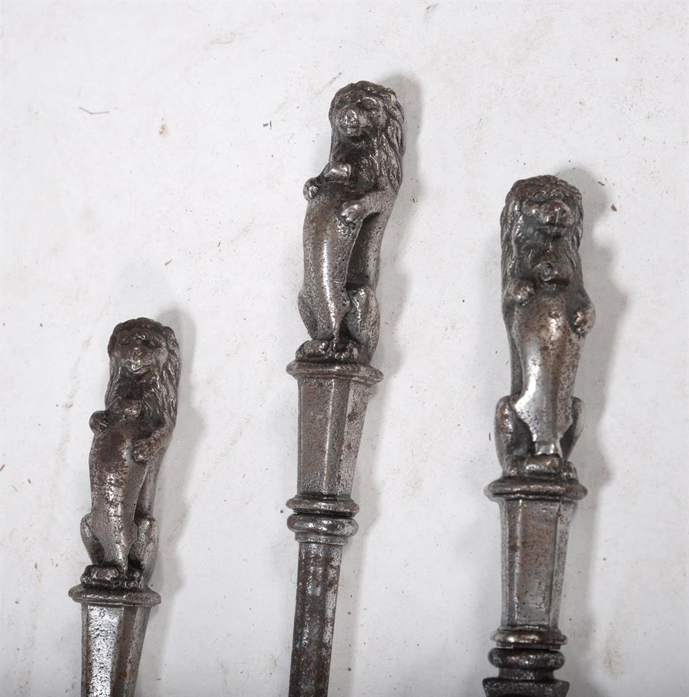 A SET OF THREE LION HANDLED POLISHED STEEL FIRE TOOLS, EARLY 19TH CENTURY - Image 2 of 3